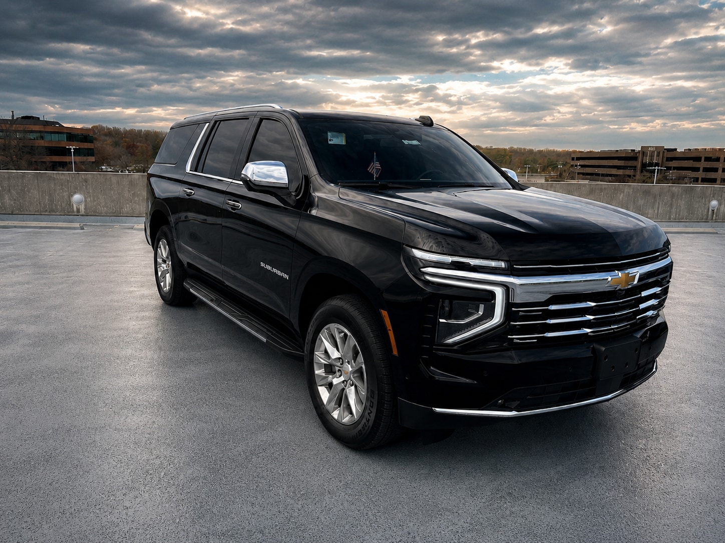Black Chevrolet Suburban Premier, front three-quarter view