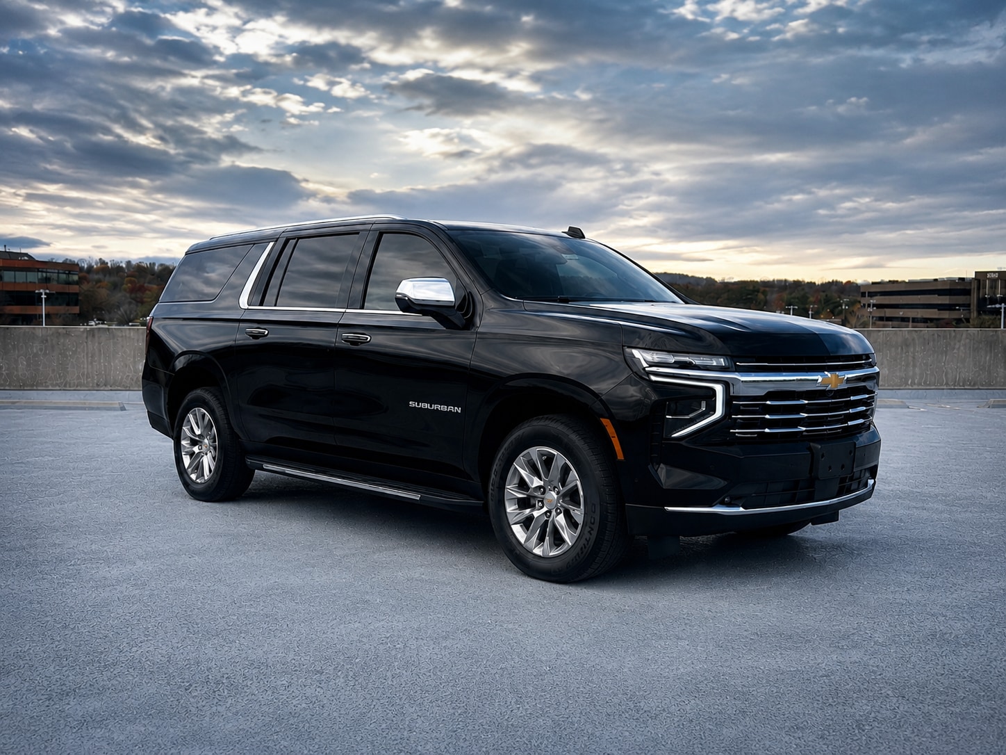 Black Chevrolet Suburban Premier, side profile